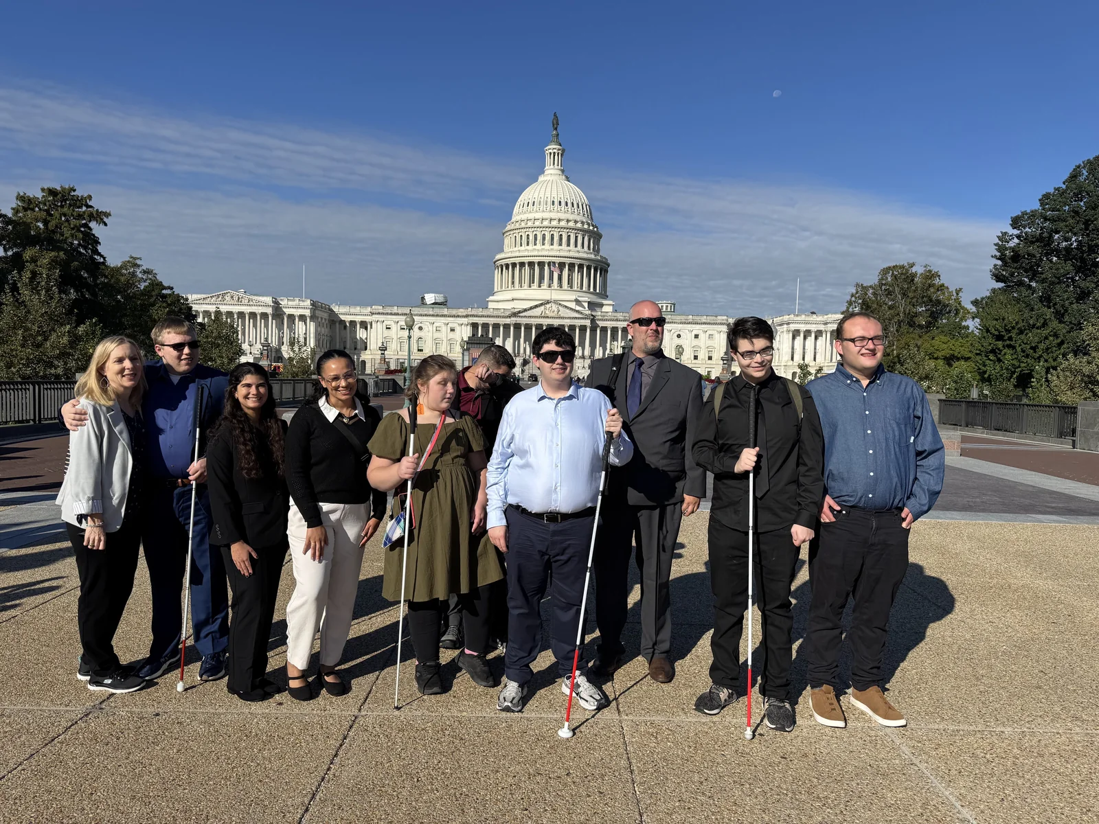 Members of the group gather in front of the U.S. Capitol.